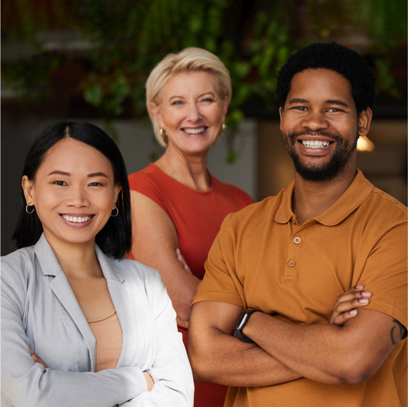 A group of people looking at the camera, 2 females and 1 male.